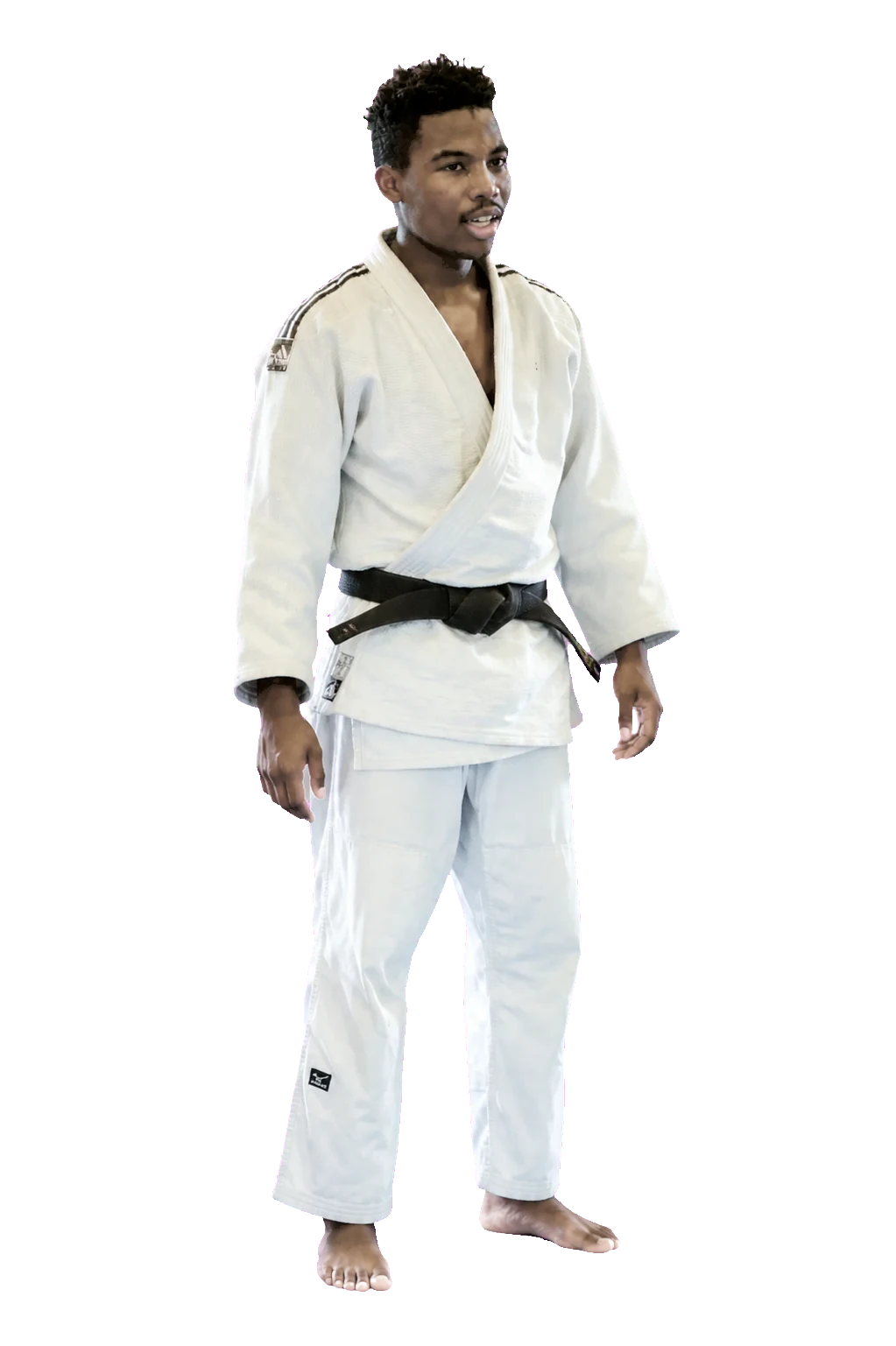 Enseignant adulte du club en kimono et ceinture noire